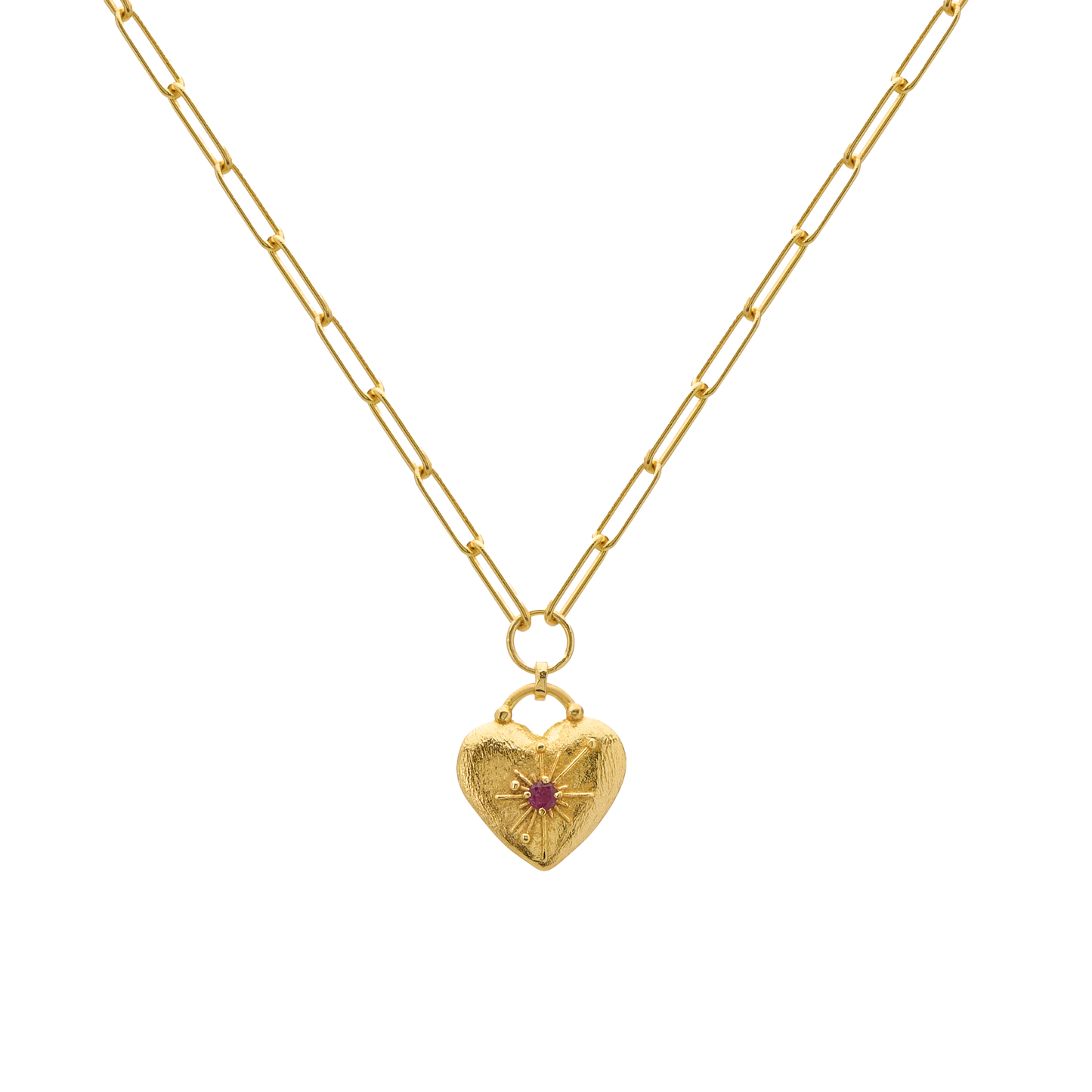 Gold heart-shaped necklace with a central gemstone on a white background