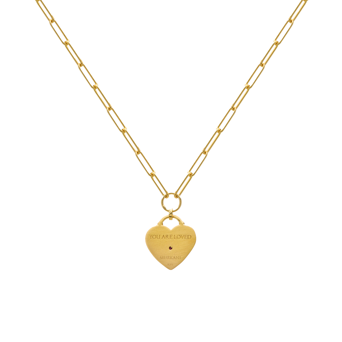 Gold necklace with a heart-shaped pendant on a white background