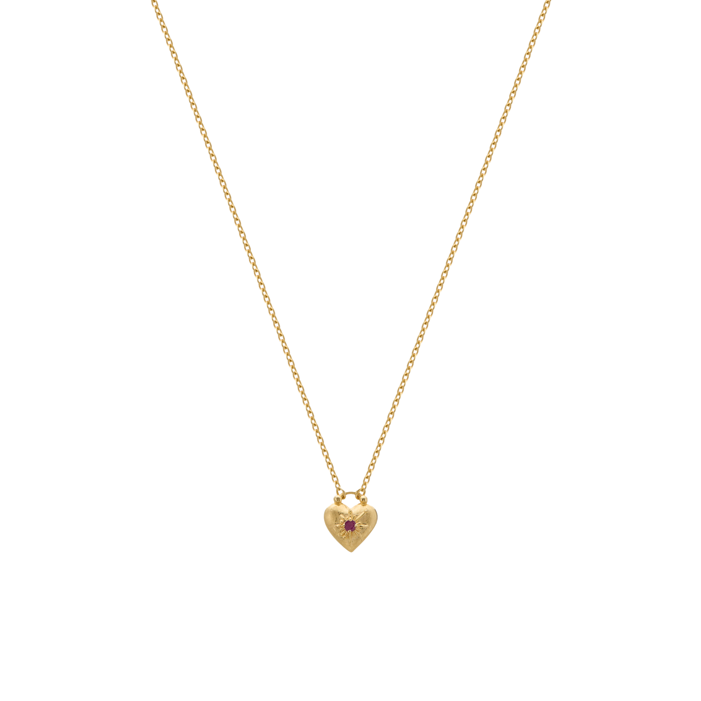 Gold necklace with a heart-shaped pendant on a white background
