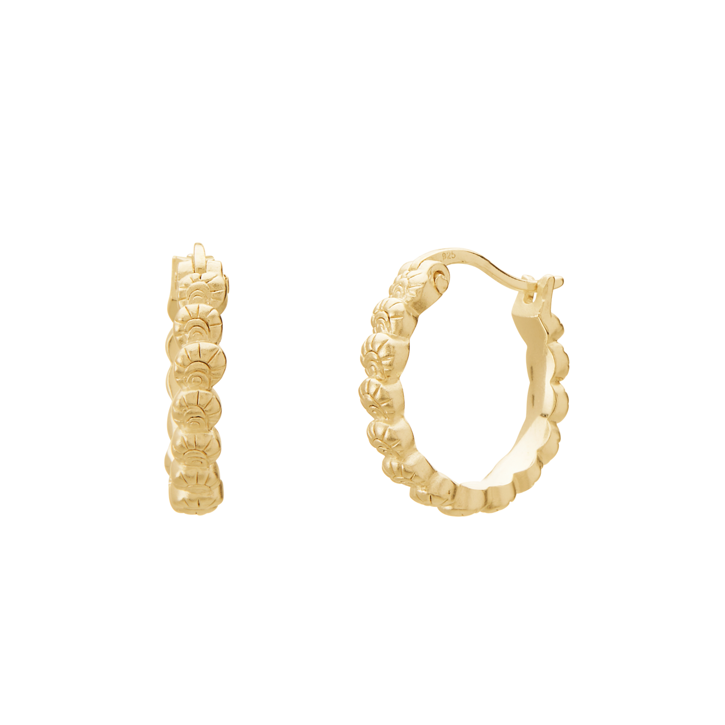 Gold hoop earrings with intricate designs on a white background