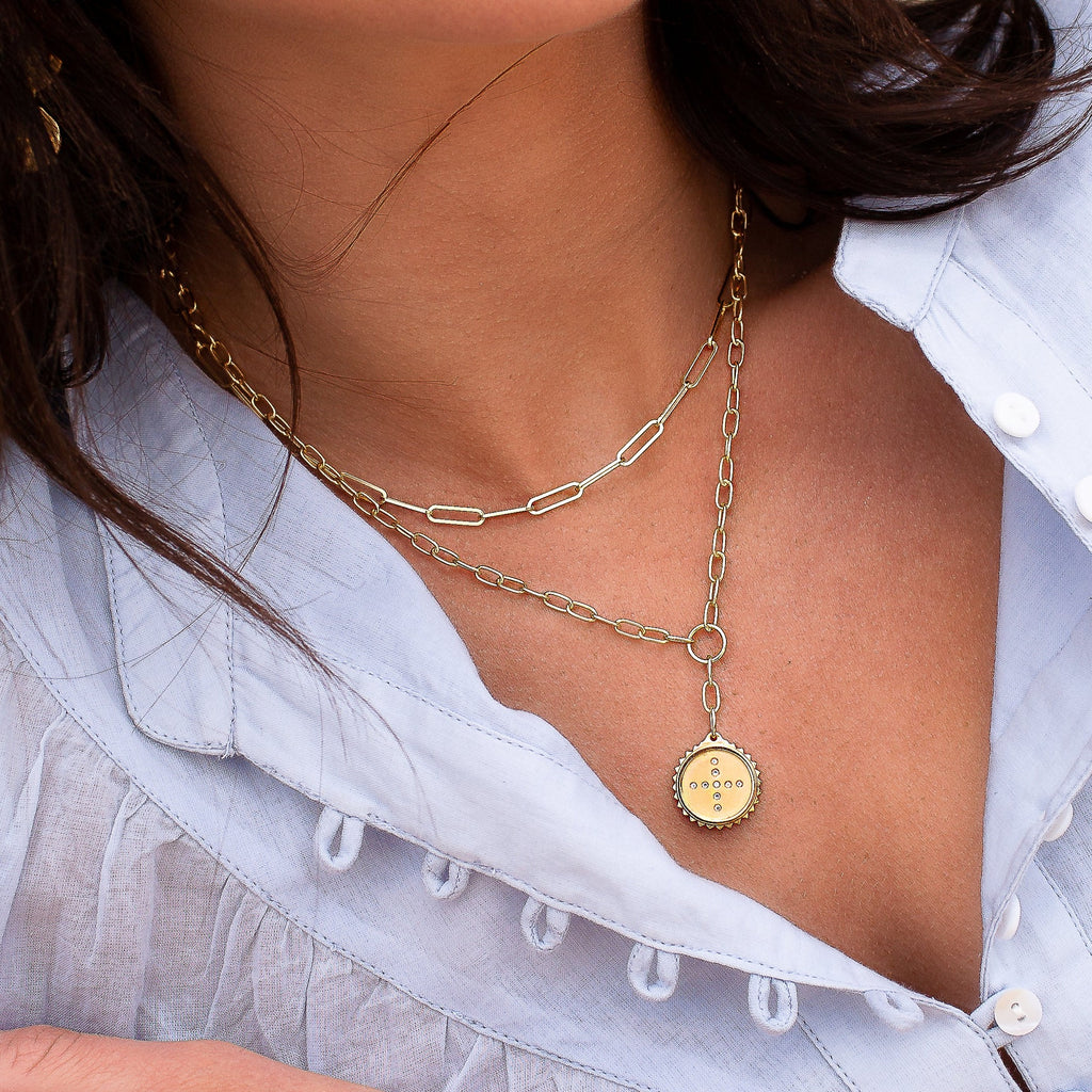 Ethically produced yellow gold drop necklace, crafted with long-lasting materials. Modern ancient jewellery.