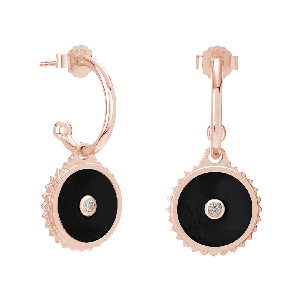 Handcrafted rose gold hoop earrings with ancient-inspired design, made with natural materials in small batches. 