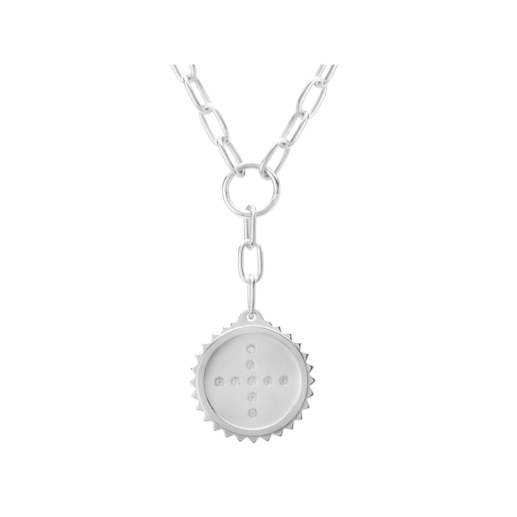 Modern sterling silver drop necklace with Celtic symbolism, featuring white topaz and crafted from natural materials.