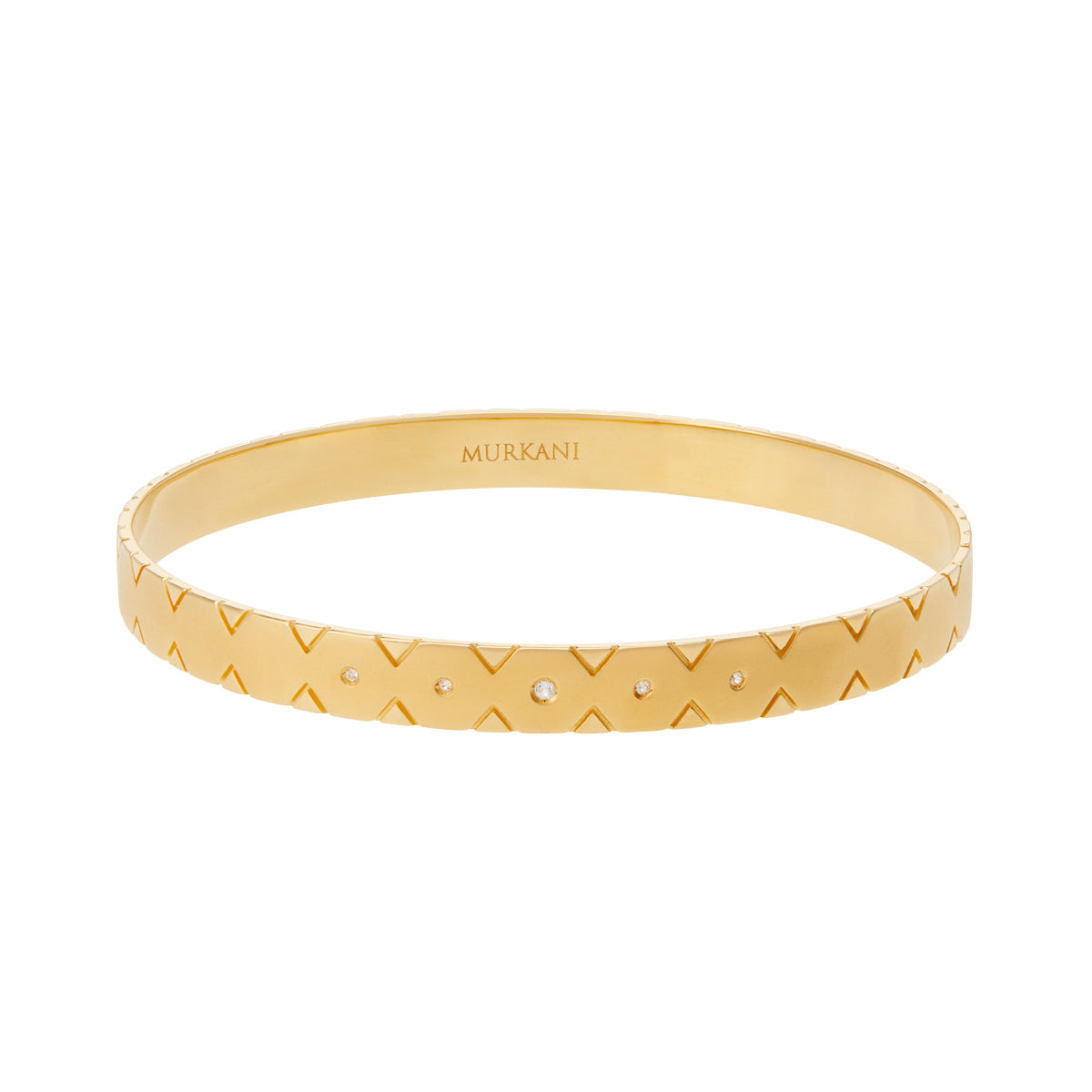 Modern gold bangle with Celtic symbolism, perfect for stacking and making a statement. Inspired by ancient symbolism.
