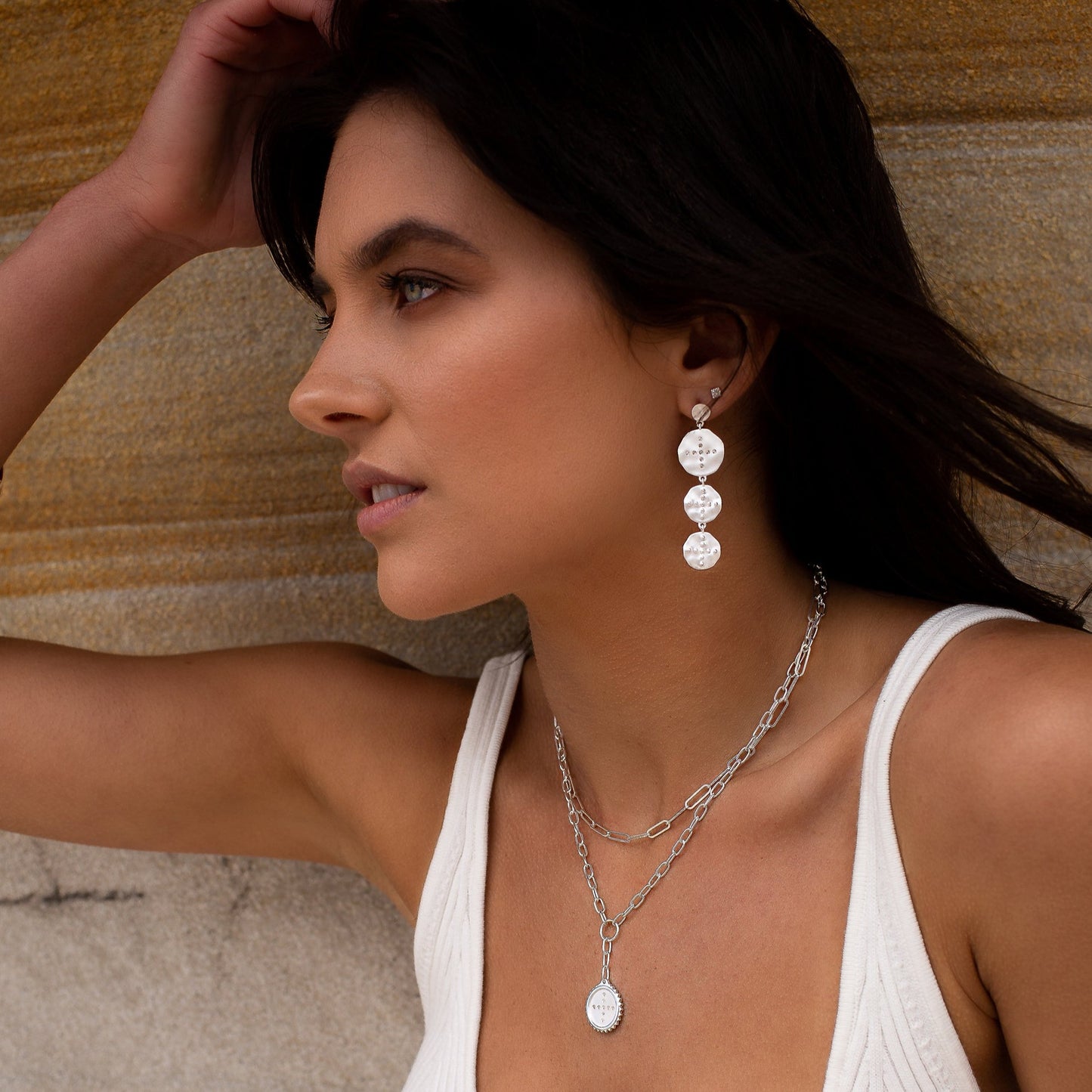 Meaningful sterling silver statement earrings with Celtic symbols of strength and courage. Ethically made production.