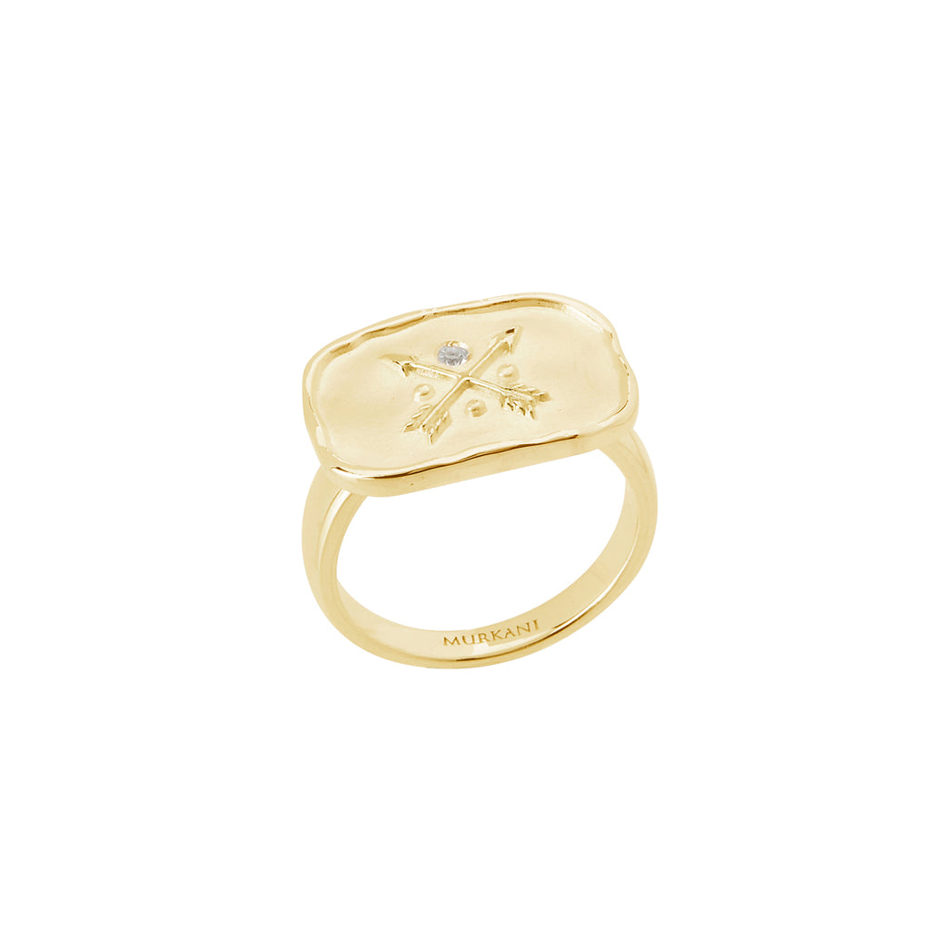Statement gold ring imbued with ancient symbolism. Artisan-made featuring crossed arrows.