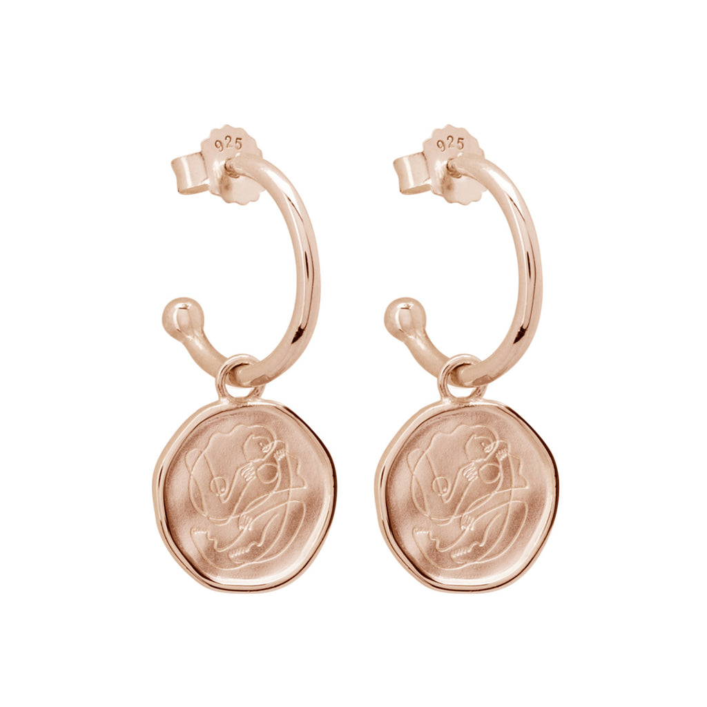 Handcrafted Rose Gold hoop earrings celebrates the bond between mother and child. Artisan-made and intricately designed. 