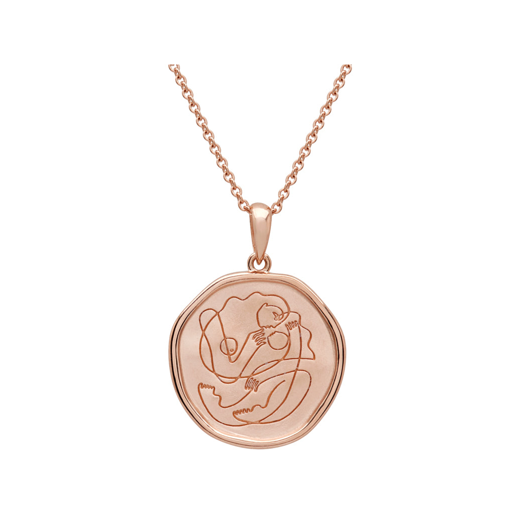 Handcrafted Rose Gold necklace celebrates the bond between mother and child. Artisan-made and intricately designed.