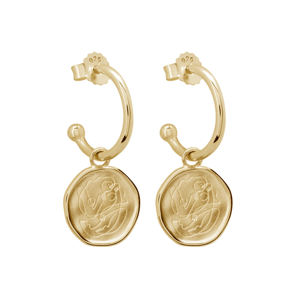 Handcrafted Gold hoop earrings celebrates the bond between mother and child. Artisan-made and intricately designed.