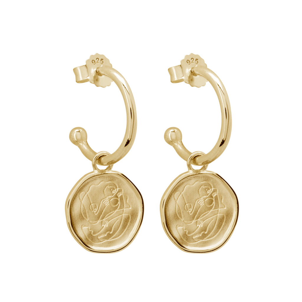 Handcrafted Gold hoop earrings celebrates the bond between mother and child. Artisan-made and intricately designed. 