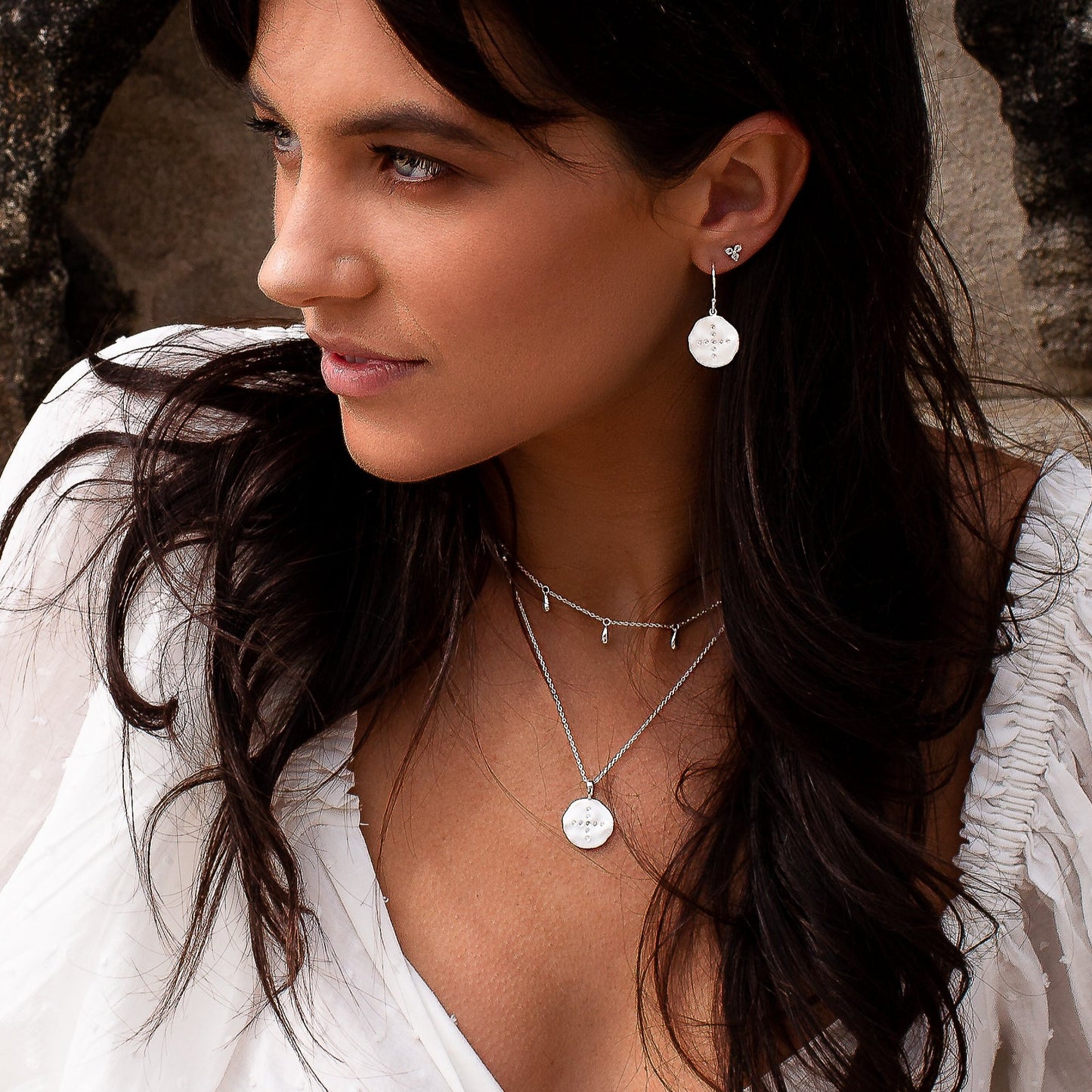 Handcrafted sterling silver necklace with white topaz gemstones. Artisan-made with natural and long-lasting materials.