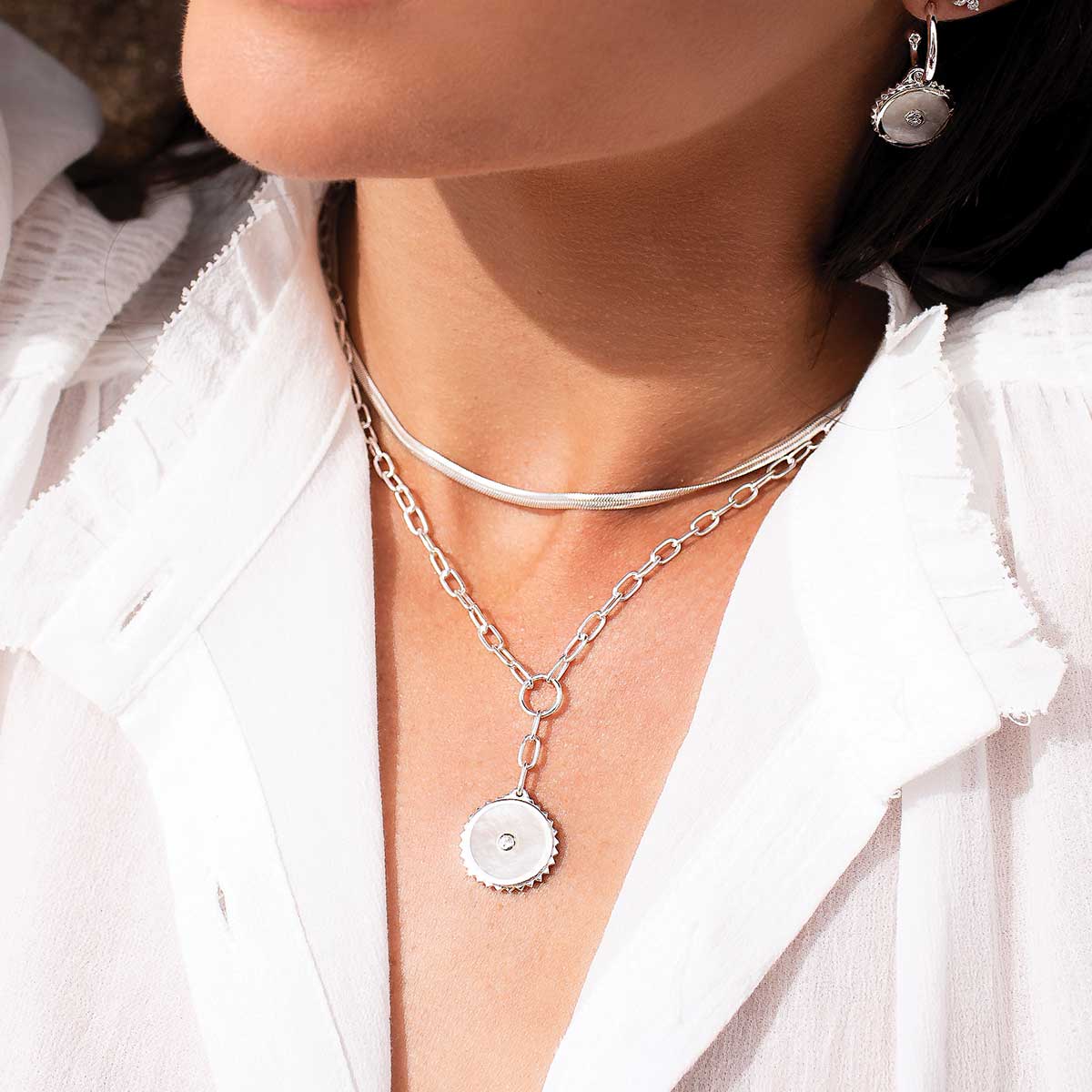 Ethically produced sterling silver drop necklace with ancient-inspired symbolism. Australian-designed artisan jewellery.