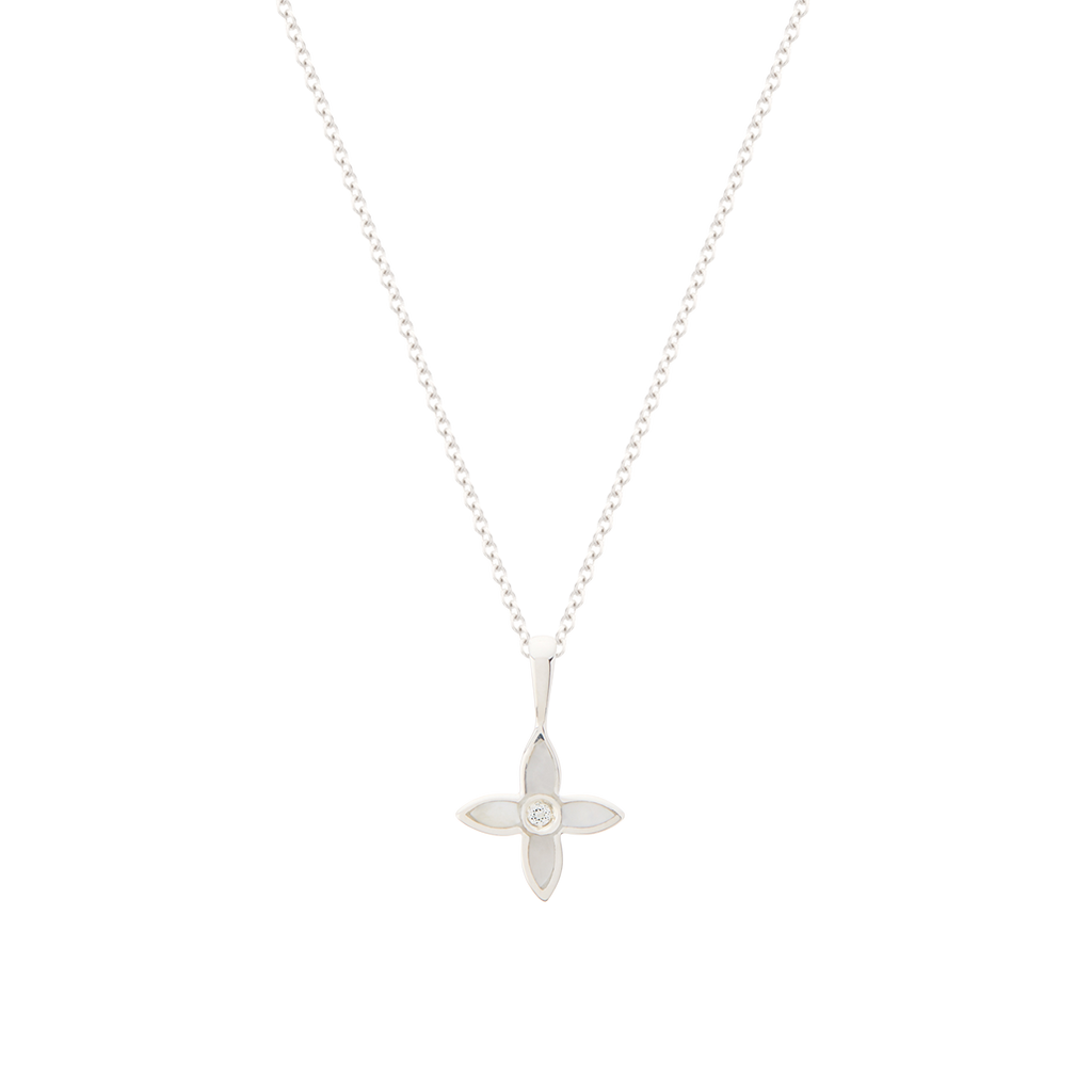Silver flower-shaped pendant necklace on a white background