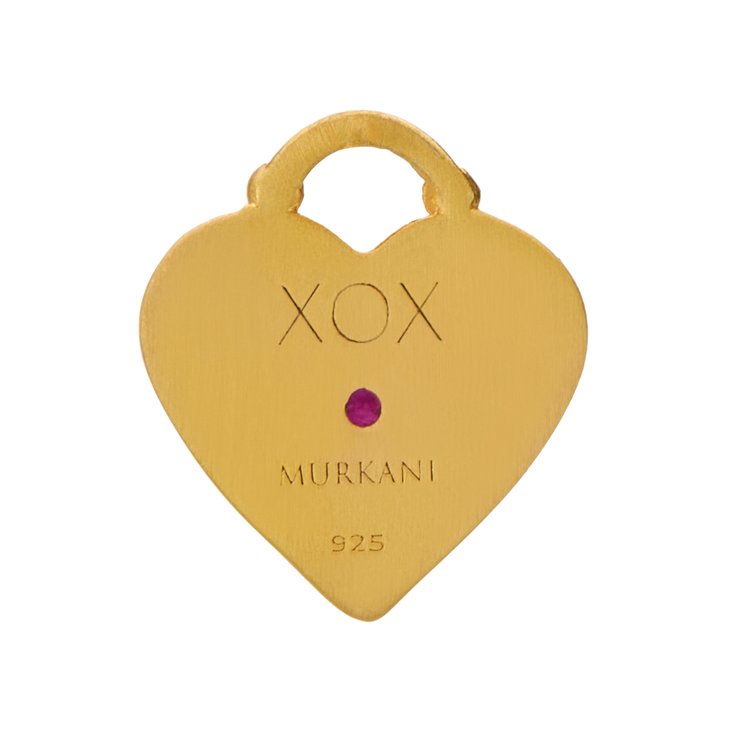 Heart-shaped gold pendant with 'XOX' and 'Murkani' branding on a white background