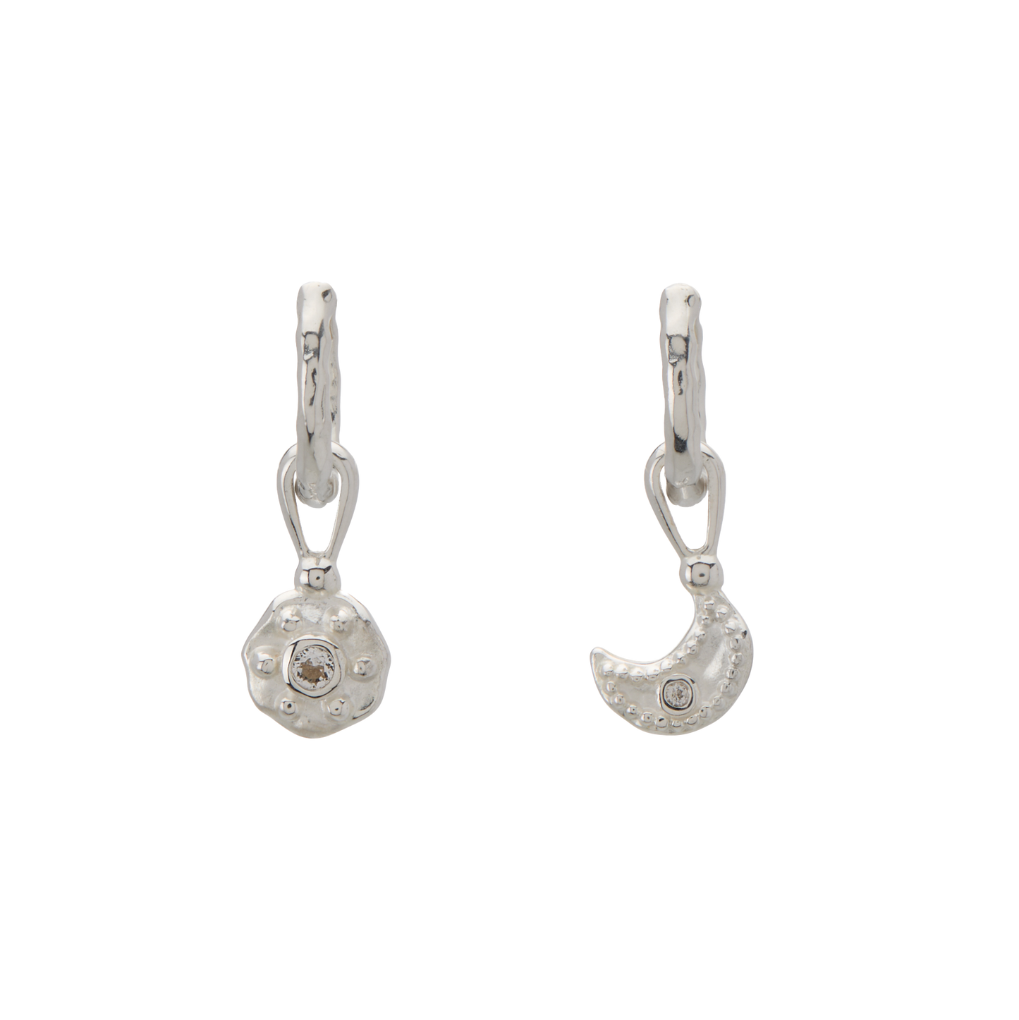 Pair of silver earrings on a white background