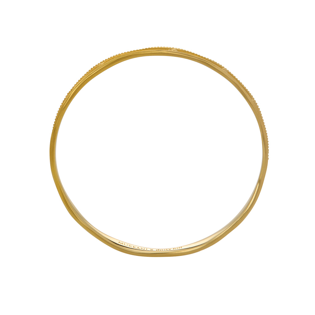 Gold ring on a white background
