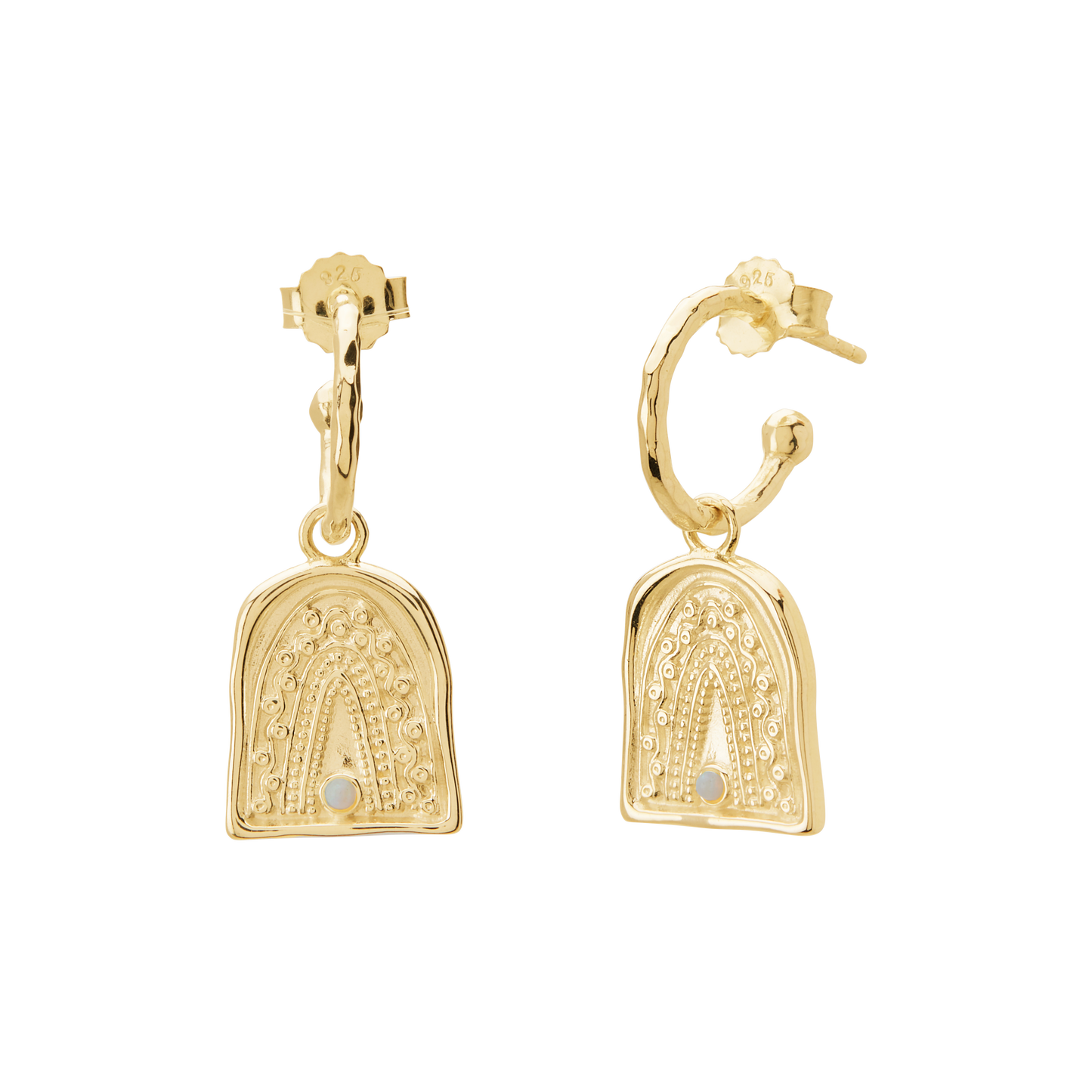 Gold earrings with intricate designs on a white background