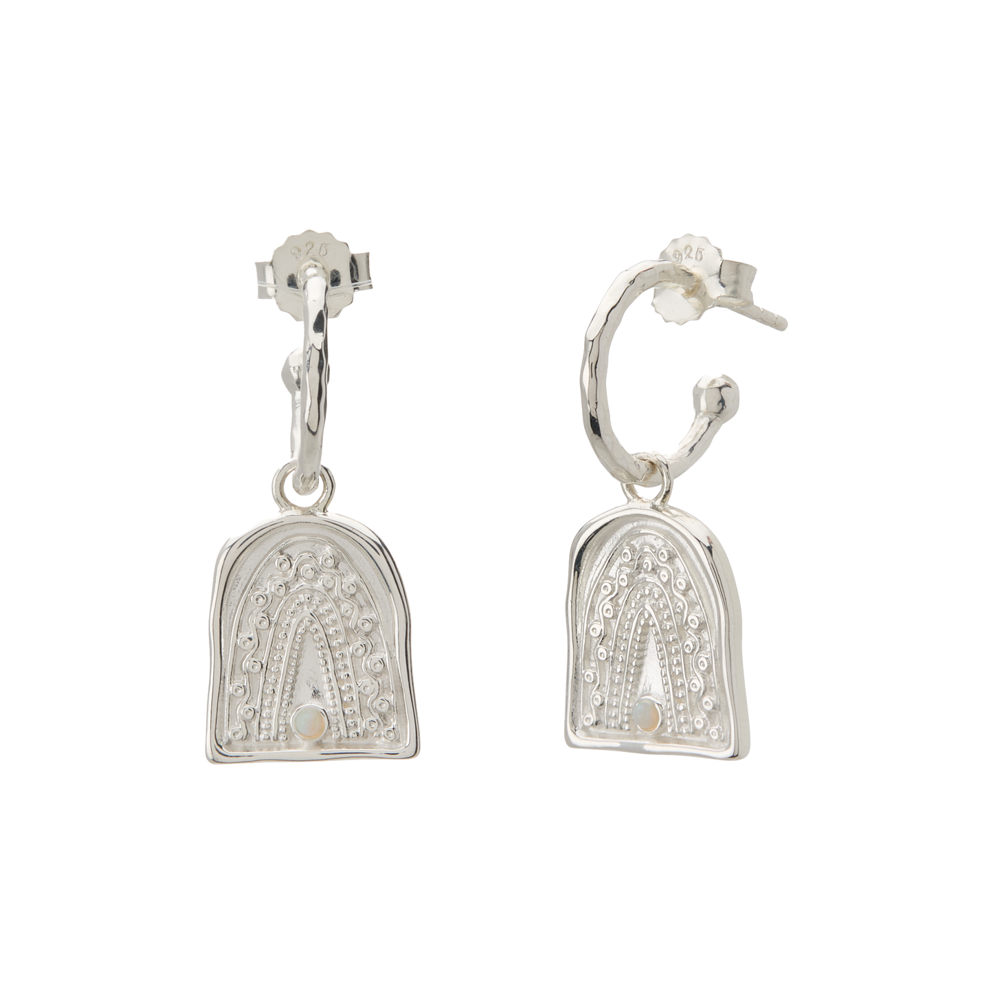 Pair of silver earrings on a white background