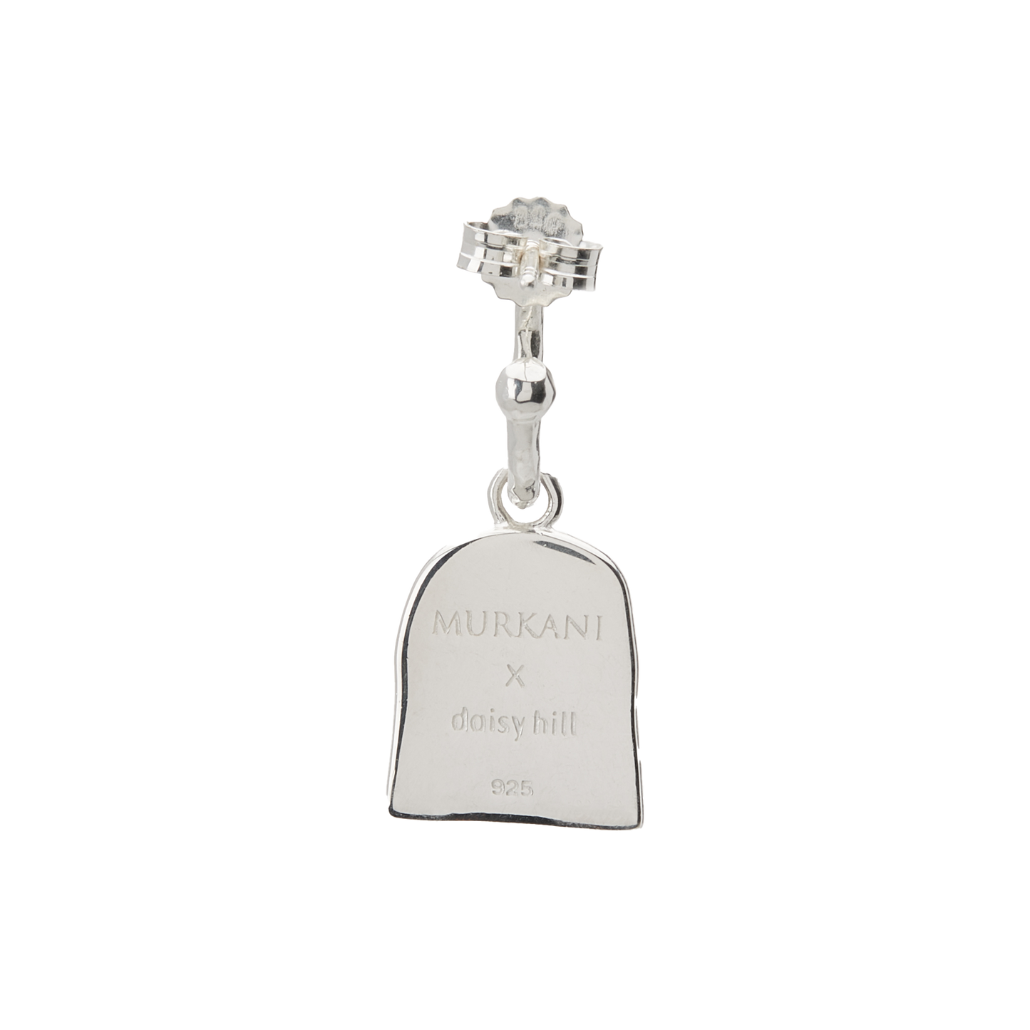 Silver charm with engraved text on a white background