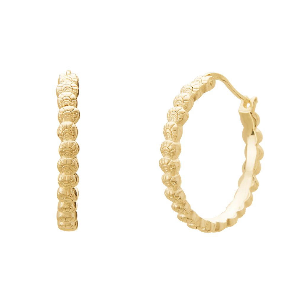 Gold hoop earrings with textured design on a white background