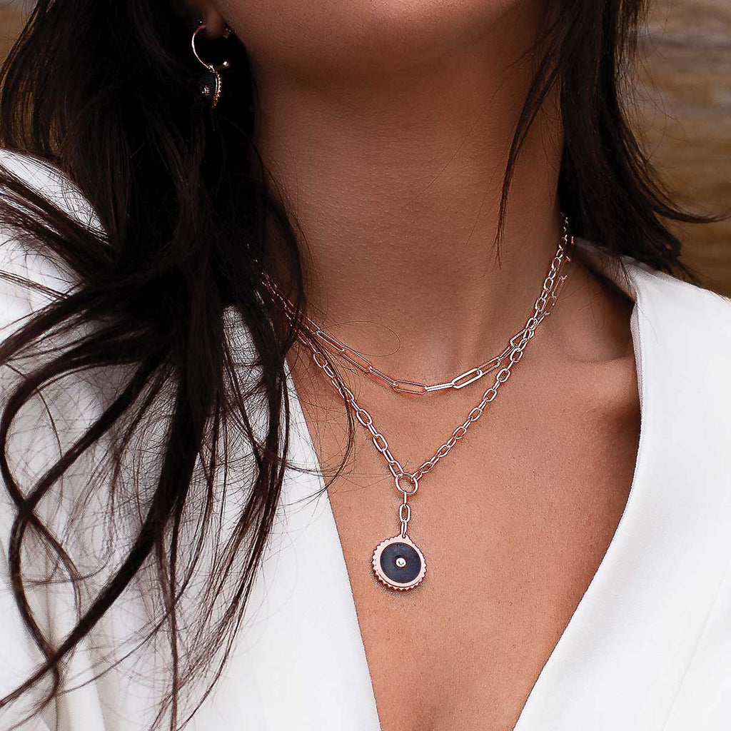 Rose gold drop necklace with meaningful ancient symbolism and black onyx gemstones, artisan-made and ethically produced.  