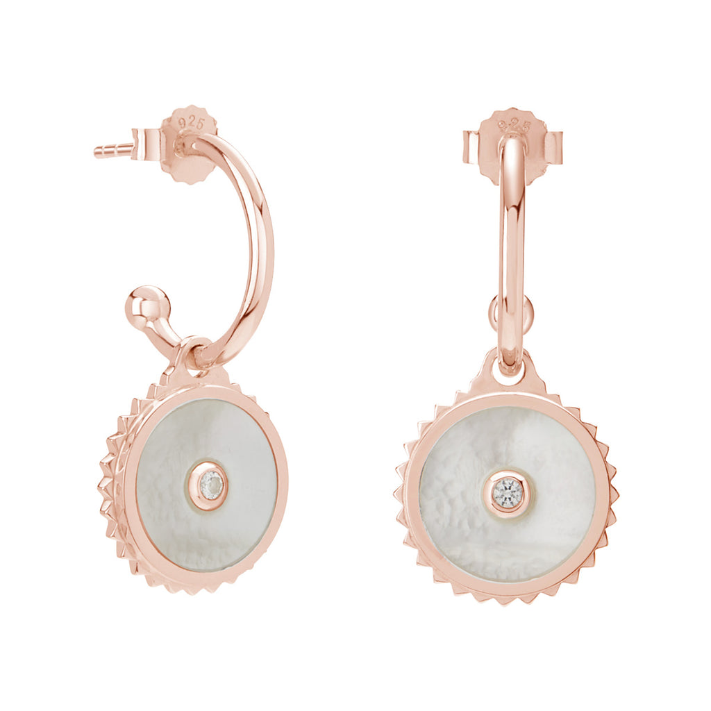Handcrafted rose gold earrings with ancient symbolism, made responsibly with natural materials for durability. 