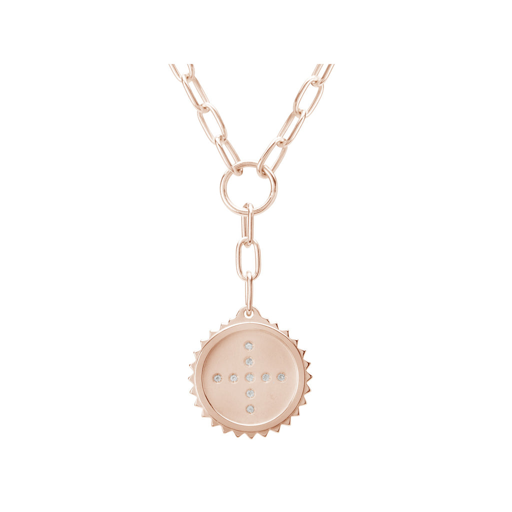 Rose gold drop necklace with white topaz and symbols of strength, and courage. Artisanal production with natural materials.