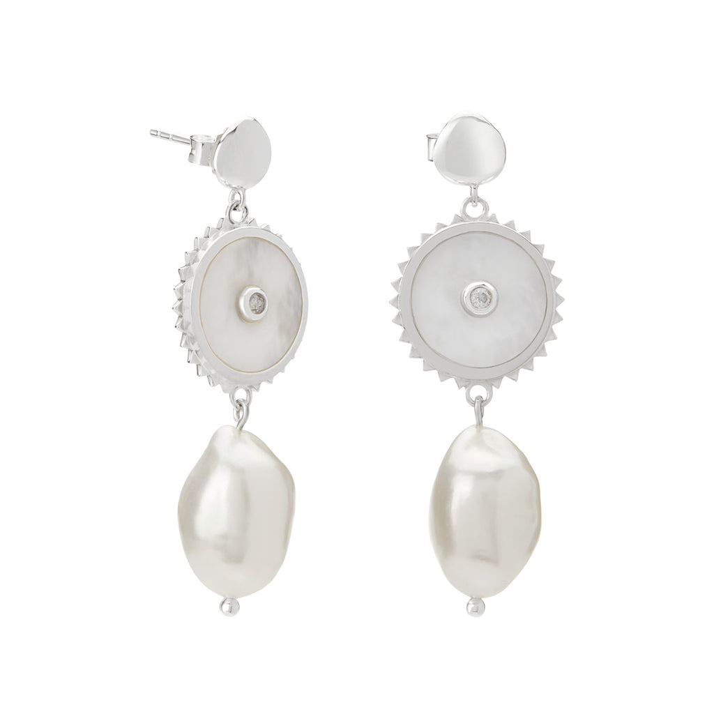 Handcrafted artisanal production of modern sterling silver pearl statement earrings, using long-lasting materials.