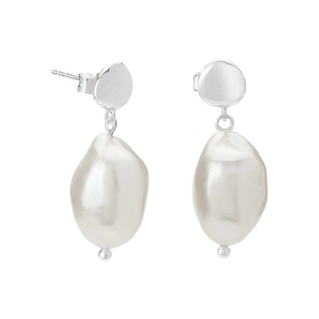 Handcrafted Sterling Silver pearl earrings made with natural materials using ethical and responsible manufacturing practices.