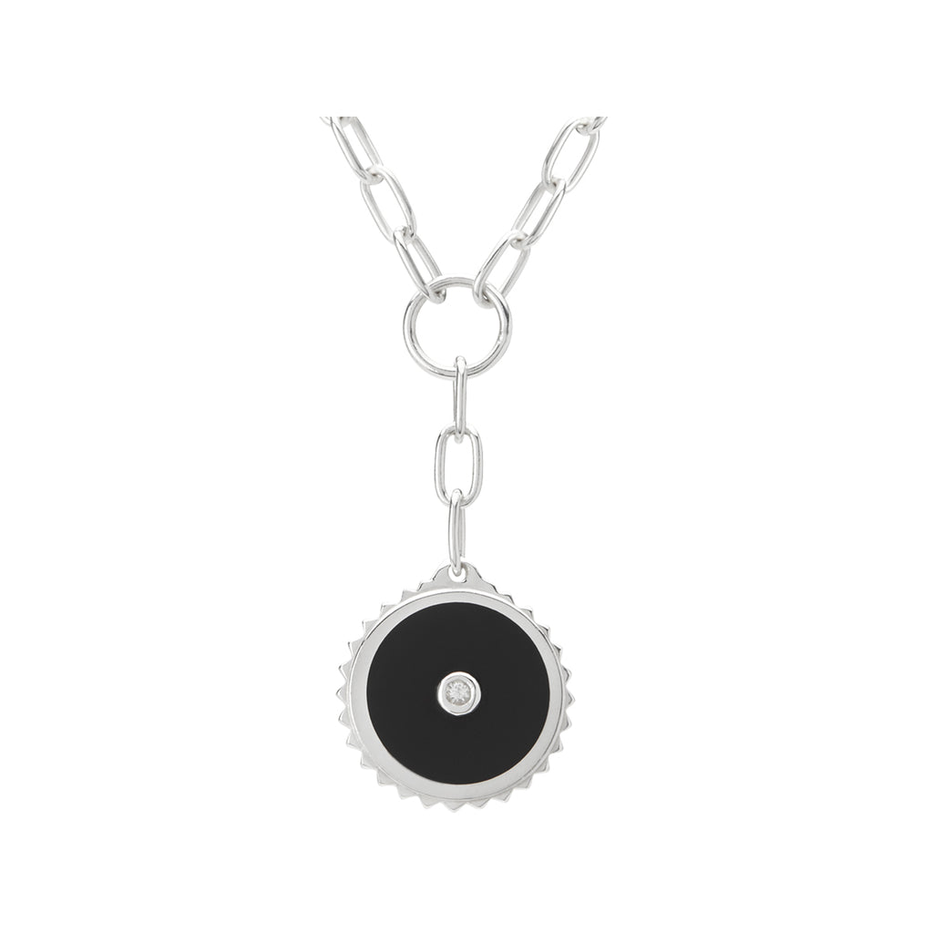 Artisan-made sterling silver drop necklace with black onyx, featuring ancient symbolism for courage and strength.