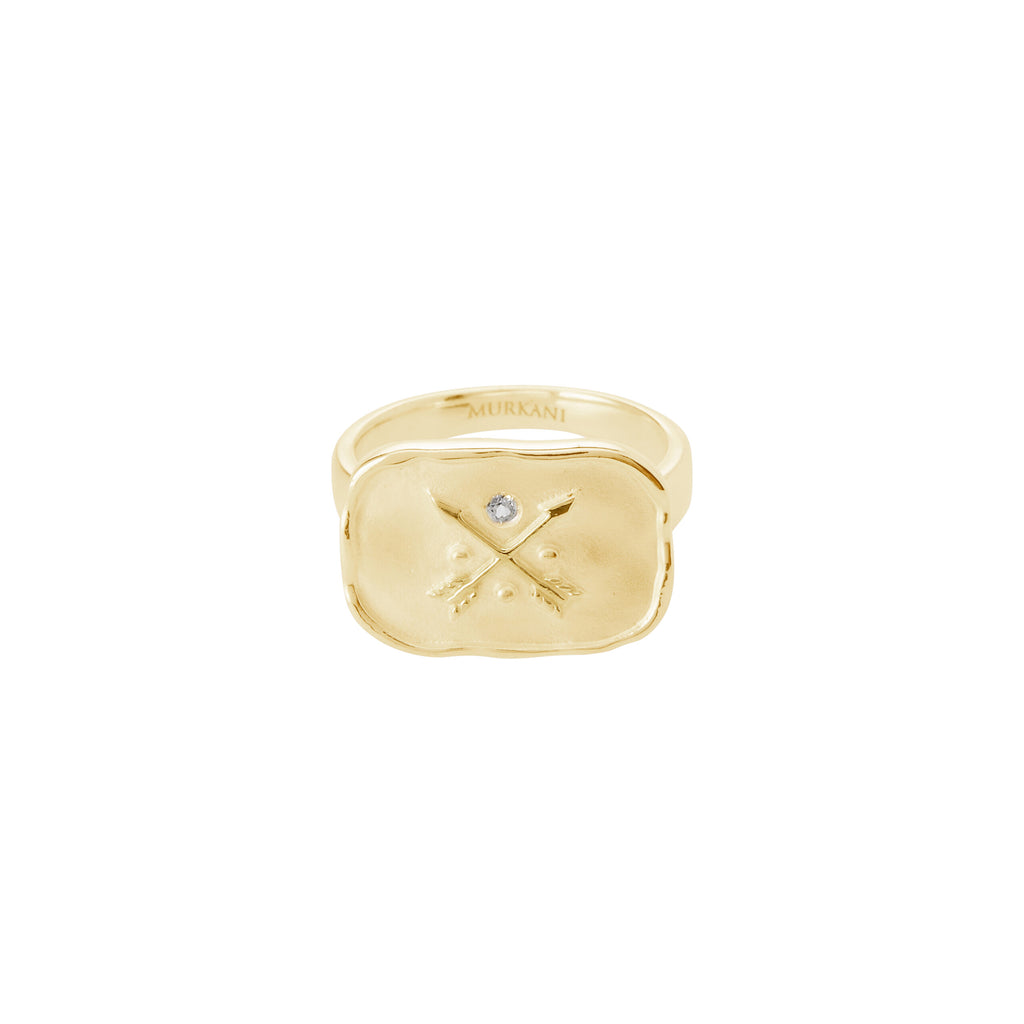Statement gold ring imbued with ancient symbolism. Artisan-made featuring crossed arrows.