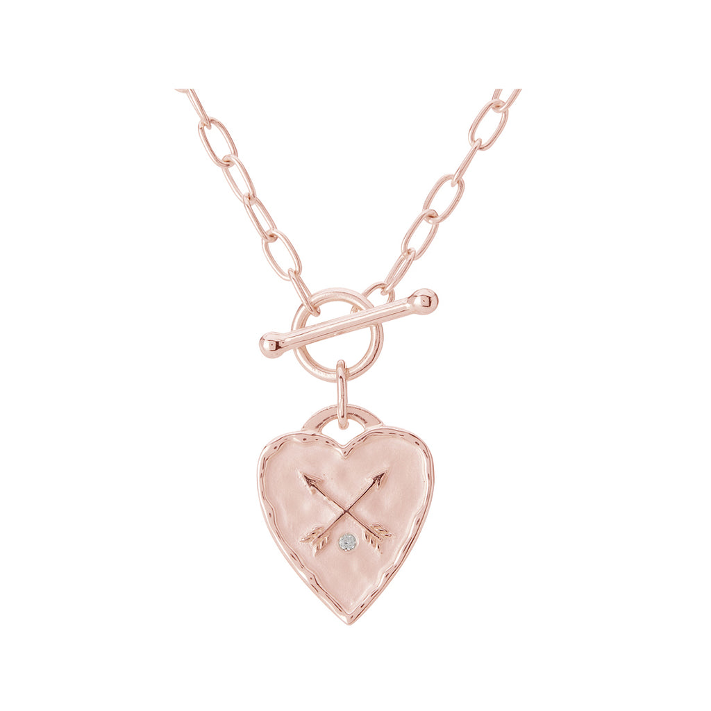 Handcrafted heart fob necklace in rose gold with ancient symbolism. Artisan-made with a charming heart design. 