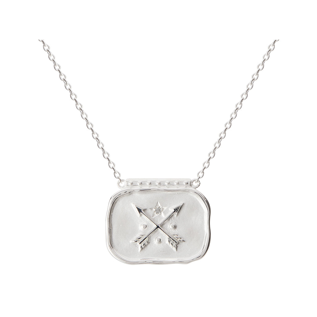 Handcrafted artisan-made pendant necklace featuring a sterling silver design of crossed arrows.