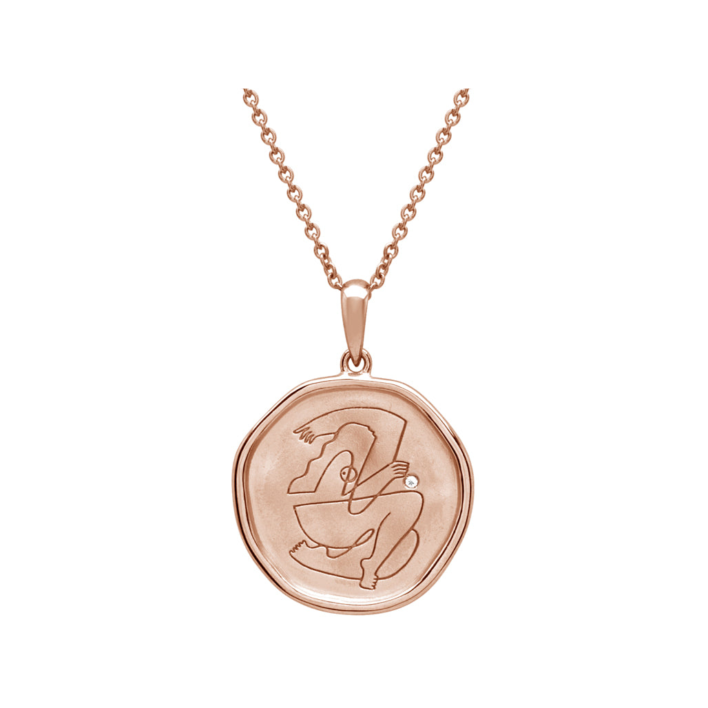 Rose Gold empowerment necklace, handcrafted by an artisan, showcasing intricate craftsmanship and attention to detail.