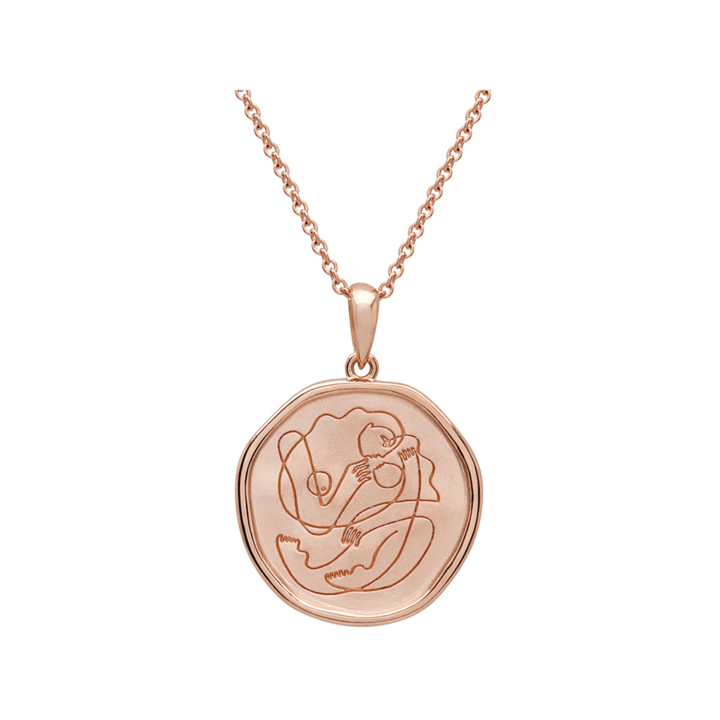 Handcrafted Rose Gold necklace celebrates the bond between mother and child. Artisan-made and intricately designed. 