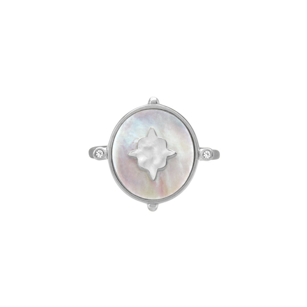 Handcrafted ring, created by skilled artisans. Featuring mother of pearl centrepiece, delicately set in a lustrous sterling silver band.