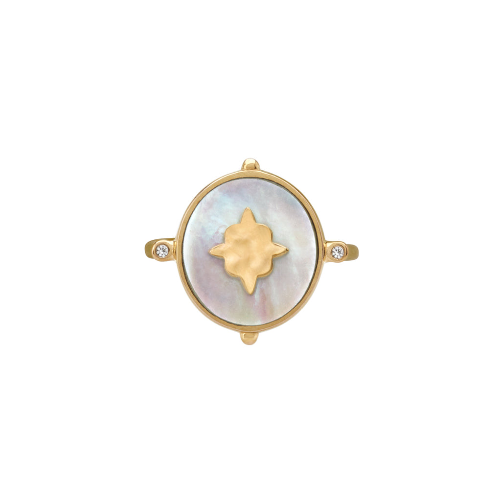 Handcrafted ring, created by skilled artisans. Featuring mother of pearl centrepiece, delicately set in a lustrous yellow gold band.