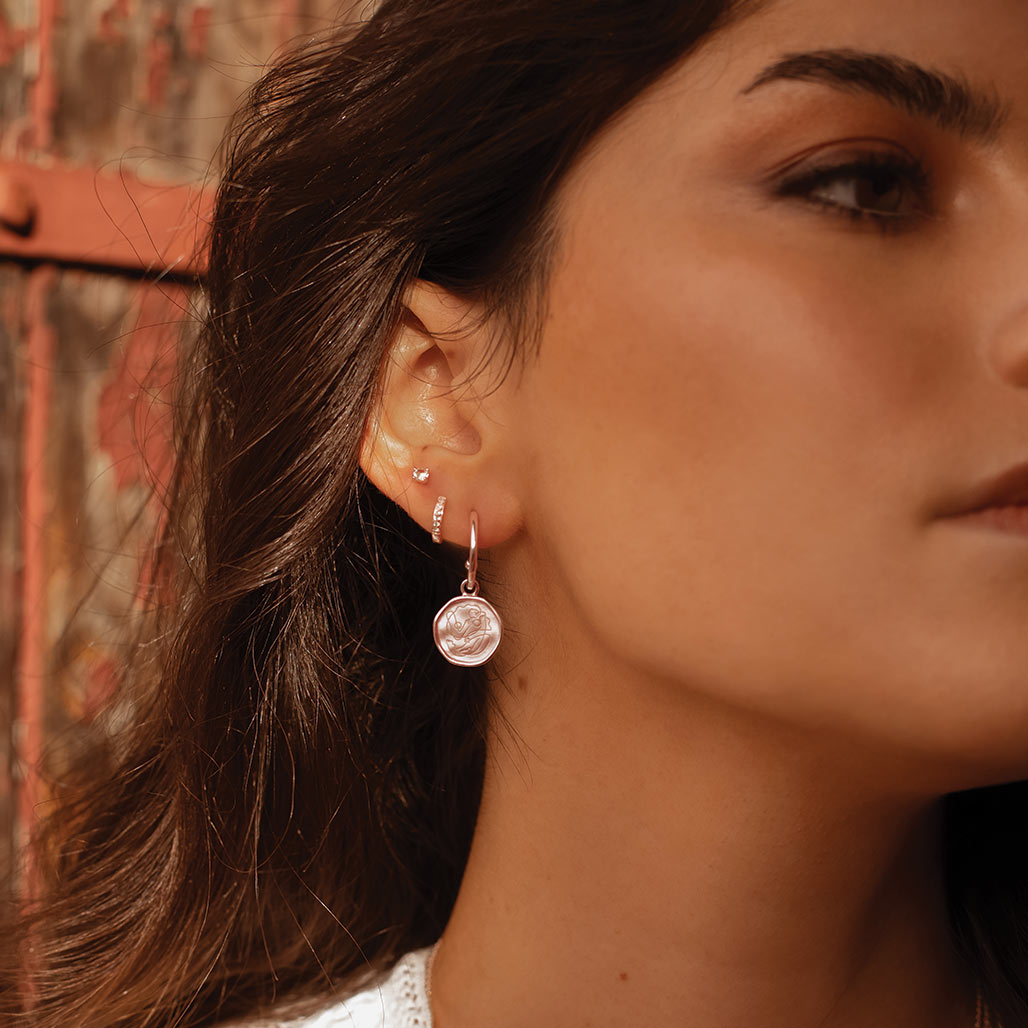 Handcrafted Rose Gold hoop earrings celebrates the bond between mother and child. Artisan-made and intricately designed. 