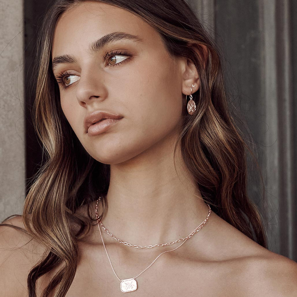 Discover exquisitely handcrafted rose gold statement earrings, a testament to love and ancient symbolism.