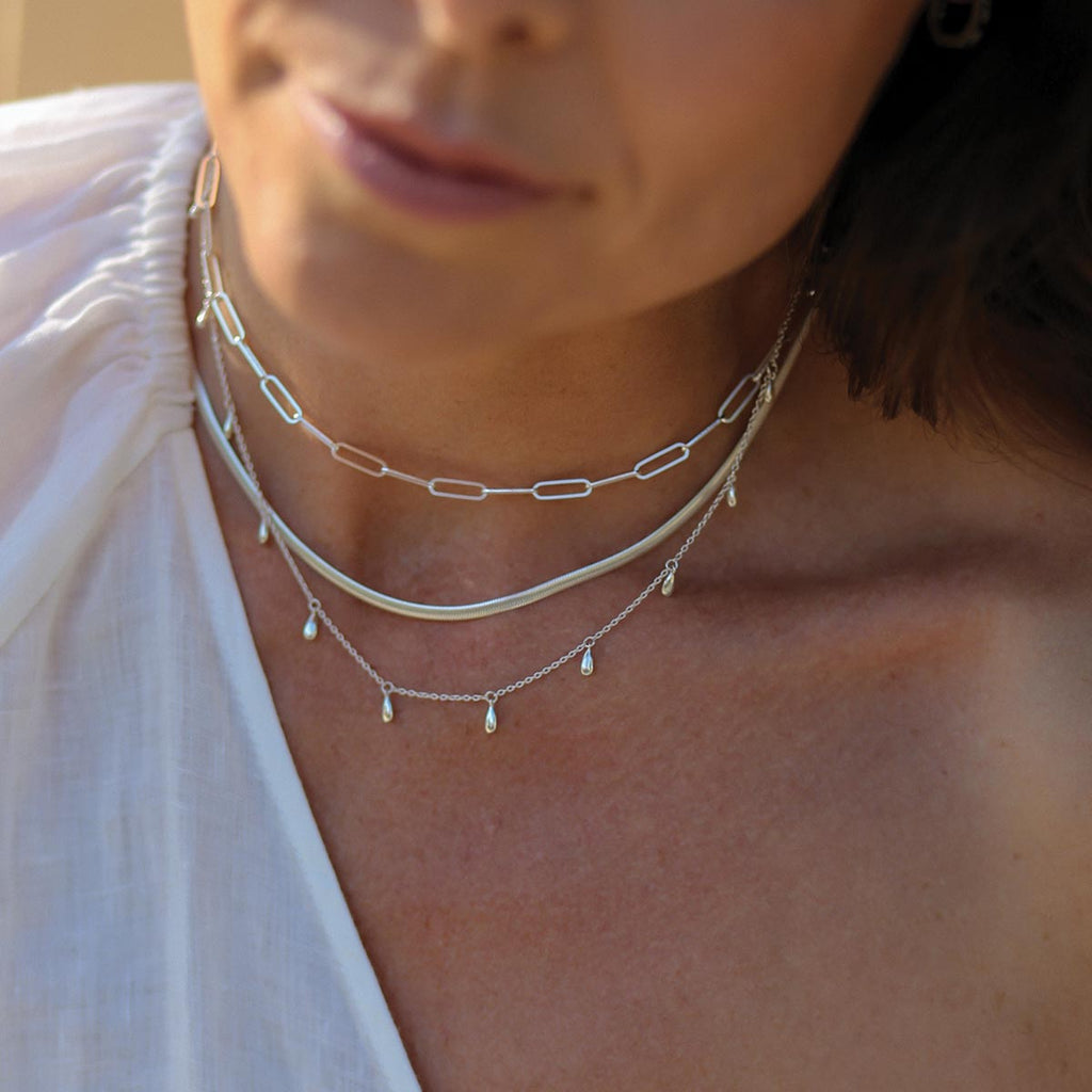 Handcrafted choker made with ethically sourced silver, featuring an originally designed and feminine style.