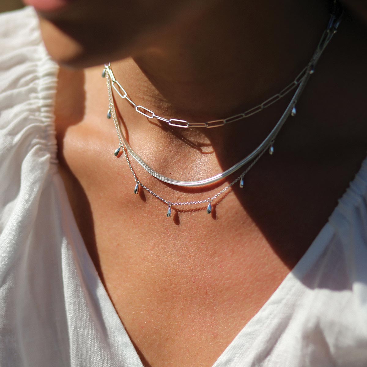 Handcrafted choker made with ethically sourced silver, featuring an originally designed and feminine style.