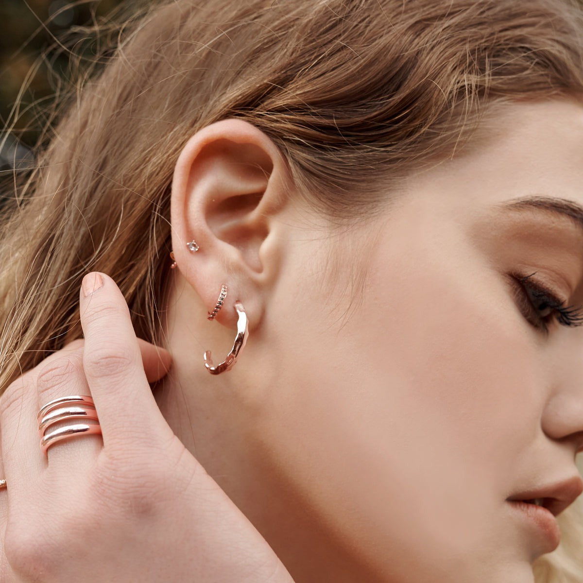 These statement earrings are the epitome of modern jewellery, boasting a textural design that exudes whimsical charm and nostalgic allure.