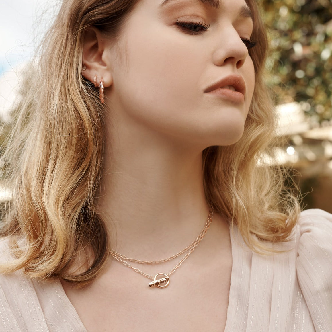 Experience a nostalgic journey with our ancient-inspired fob necklaces. Contemporary designs inspired by love letters.