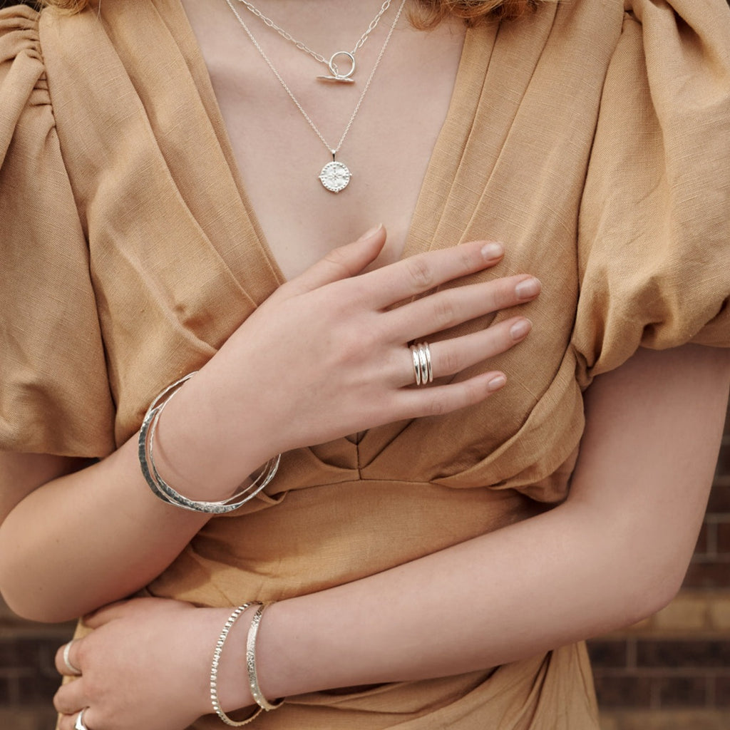 Ancient jewellery charm, the ring band boasts a full shine metal finish, perfect for the romantic and nostalgic at heart.