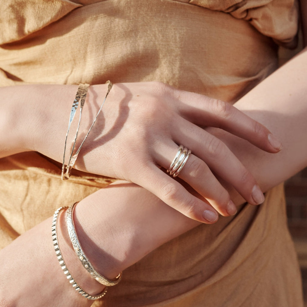 Contemporary and modern jewellery collection featuring abstract designs and full-shine metal finishes. 