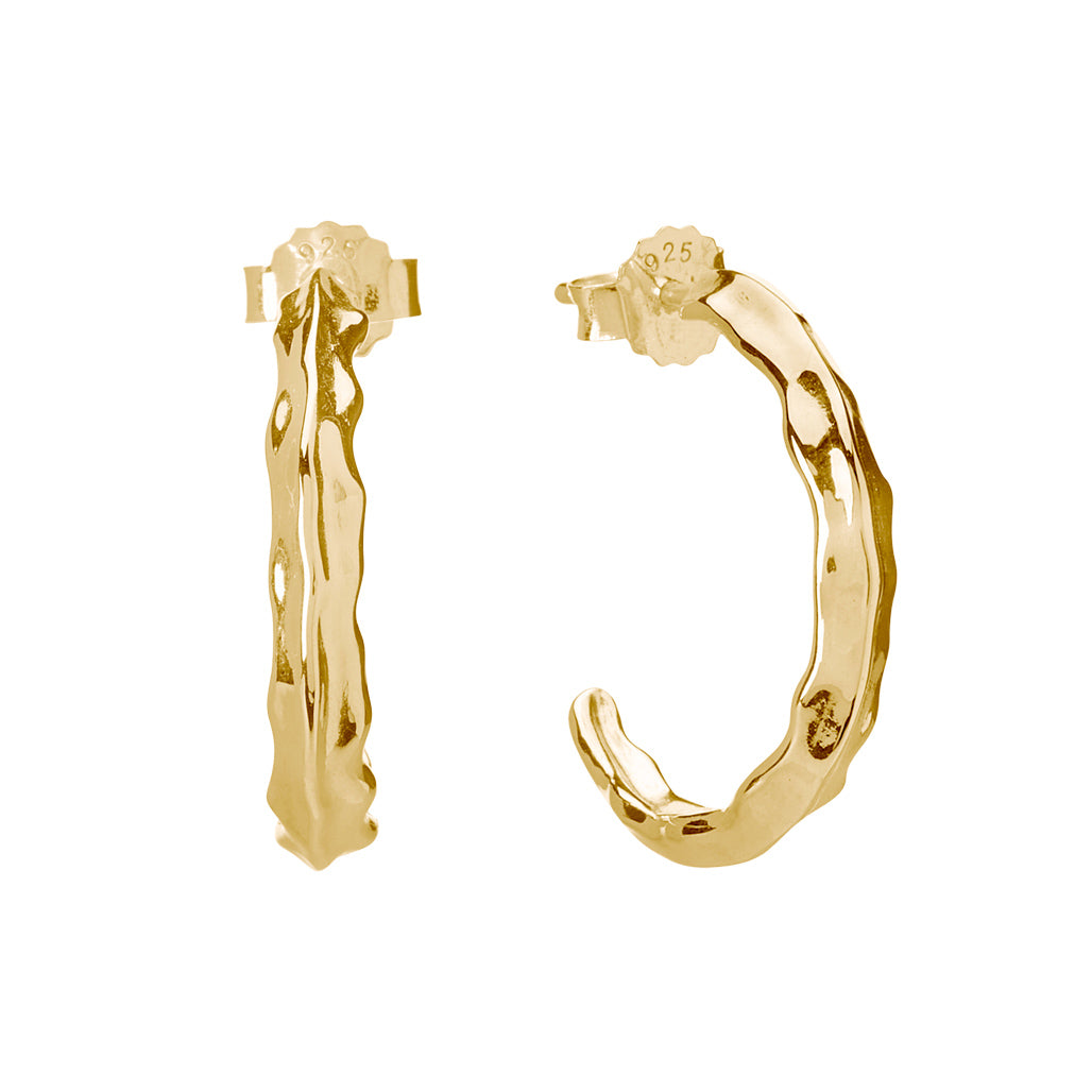 Ethically made, handcrafted gold hoops with a modern, textural design. Artisanal production and artisan-made.