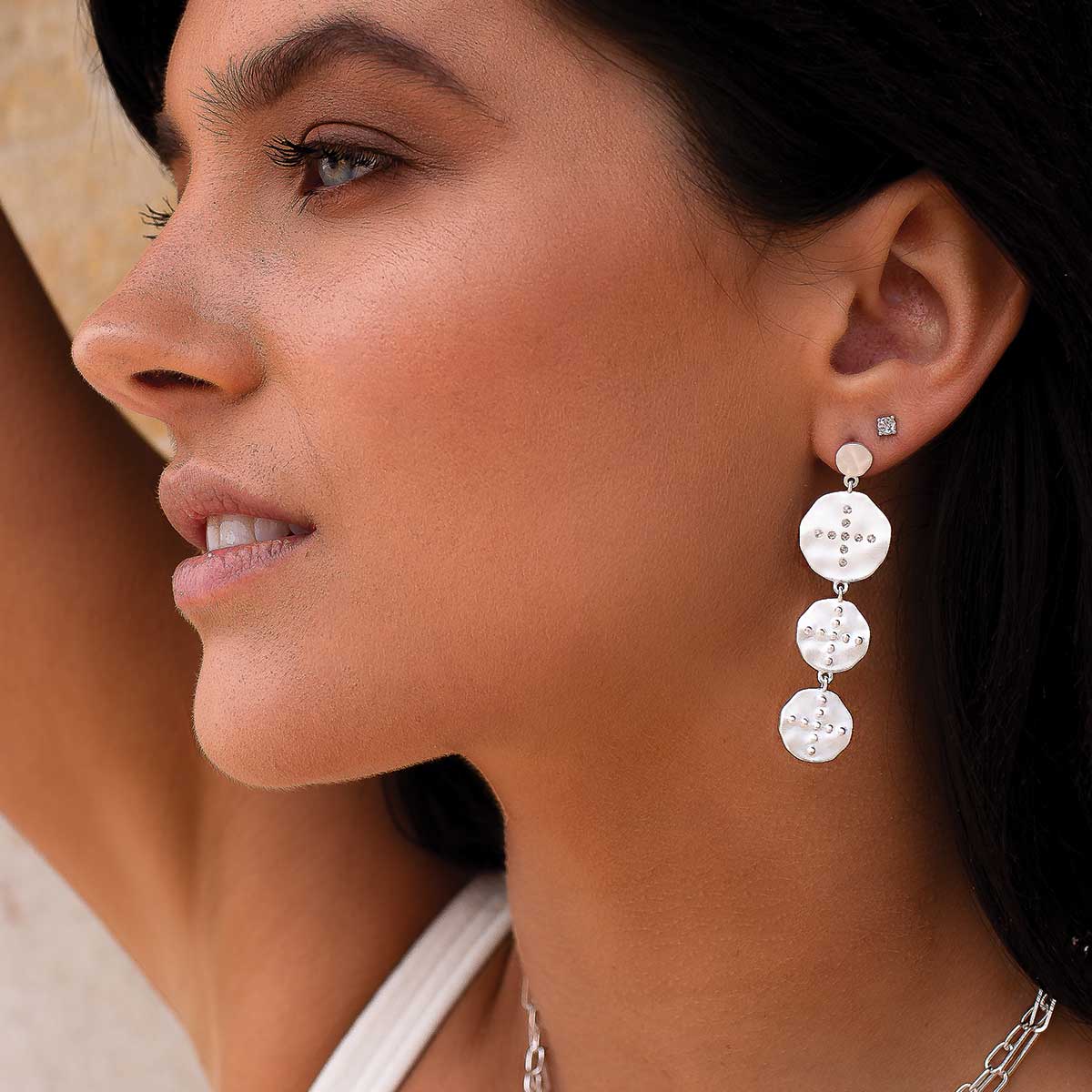 Meaningful sterling silver statement earrings with Celtic symbols of strength and courage. Ethically made production. 